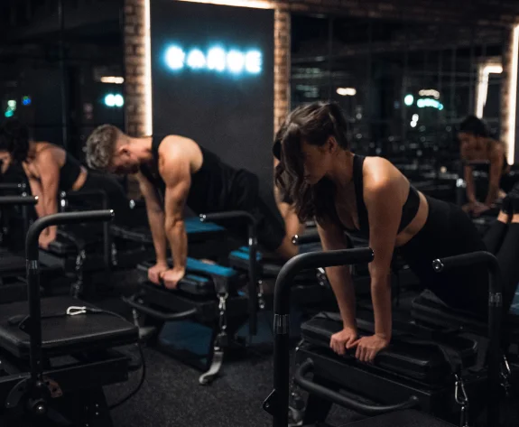 Reformer Pilates exercises with the Reformer machine